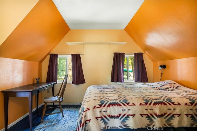 186 Hemlock Dr, Lake Arrowhead, CA 92352 - bedroom with multiple windows, lofted ceiling, and baseboards