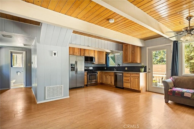 186 Hemlock Dr, Lake Arrowhead, CA 92352 - kitchen with stainless steel appliances, wood ceiling with exposed beams, light wood-style floors, open floor plan, and a ceiling fan