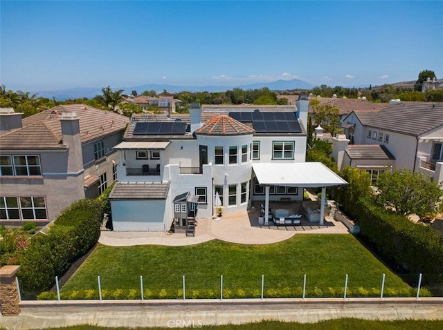 31 Harcourt, Newport Coast, CA 92657 - rear view of property with a patio, a residential view, and solar panels