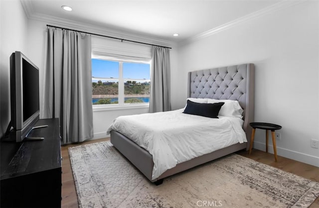 31 Harcourt, Newport Coast, CA 92657 - bedroom with crown molding, baseboards, wood finished floors, and recessed lighting