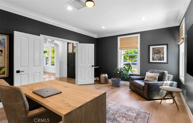 31 Harcourt, Newport Coast, CA 92657 - home office with healthy amount of natural light, light wood-style flooring, crown molding, baseboards, and recessed lighting