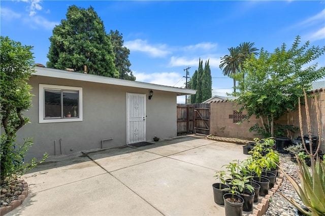 9861 E Lemon Ave, Arcadia, CA 91007 - back of property featuring stucco siding and a patio area