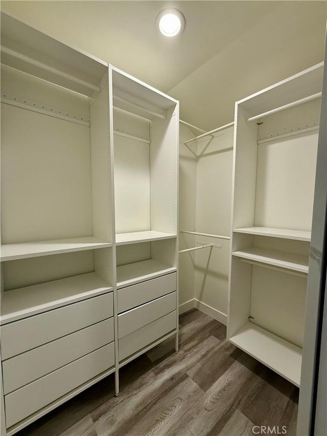 5472 3rd Ave, Los Angeles, CA 90043 - walk in closet with dark wood finished floors