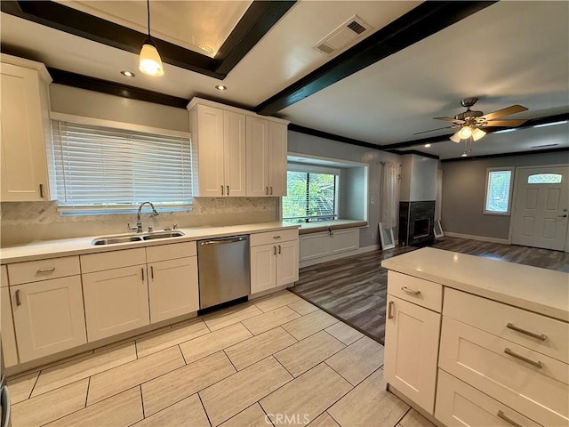 5472 3rd Ave, Los Angeles, CA 90043 - kitchen with dishwasher, a sink, backsplash, light countertops, and recessed lighting