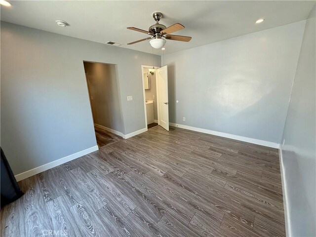 5472 3rd Ave, Los Angeles, CA 90043 - spare room featuring wood finished floors, a ceiling fan, and baseboards