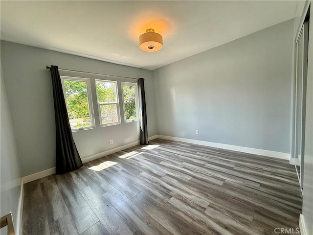 5472 3rd Ave, Los Angeles, CA 90043 - spare room featuring wood finished floors and baseboards