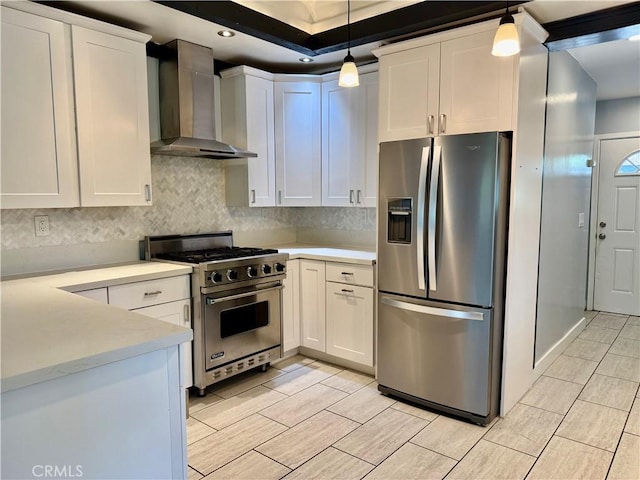 5472 3rd Ave, Los Angeles, CA 90043 - kitchen with stainless steel appliances, wall chimney range hood, light countertops, and white cabinets