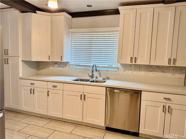 5472 3rd Ave, Los Angeles, CA 90043 - kitchen with stainless steel dishwasher, a sink, light countertops, and white cabinets