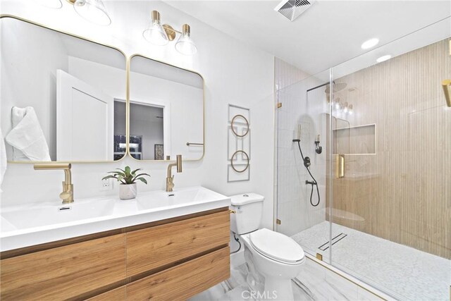 34021 La Serena Dr, Dana Point, CA 92629 - bathroom with toilet, double vanity, and a stall shower