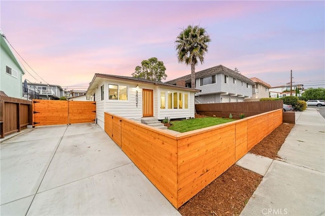 34021 La Serena Dr, Dana Point, CA 92629 - view of front of property with a fenced backyard, entry steps, and a patio