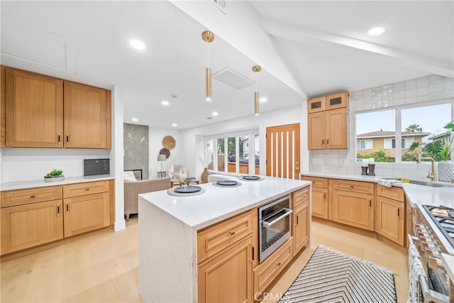 34021 La Serena Dr, Dana Point, CA 92629 - kitchen with a sink, decorative backsplash, light countertops, recessed lighting, and decorative light fixtures