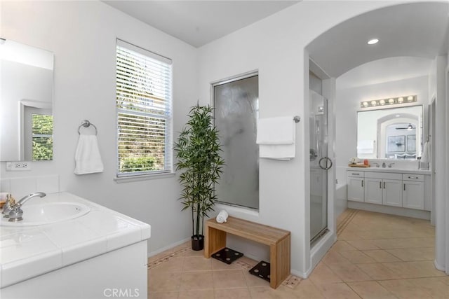 25815 Forsythe Way, Stevenson Ranch, CA 91381 - bathroom featuring tile patterned flooring, vanity, a shower stall, and healthy amount of natural light
