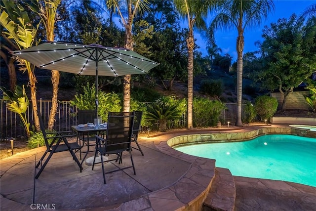 25815 Forsythe Way, Stevenson Ranch, CA 91381 - view of swimming pool with a fenced backyard, a patio, a pool with connected hot tub, and outdoor dining area