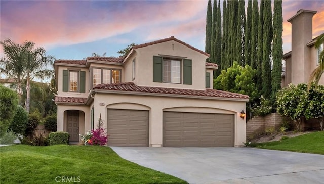 25815 Forsythe Way, Stevenson Ranch, CA 91381 - mediterranean / spanish home featuring driveway, a garage, stucco siding, a tile roof, and a yard