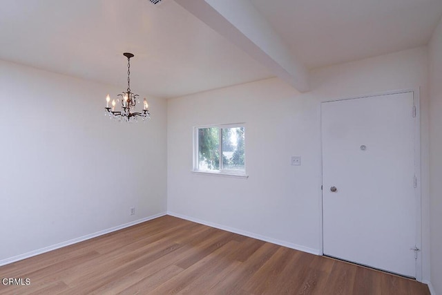 5020 Carolyn Way, Glendale, CA 91214 - spare room with wood finished floors, a chandelier, baseboards, and beamed ceiling