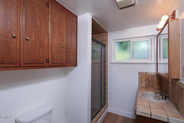 5020 Carolyn Way, Glendale, CA 91214 - full bathroom with toilet, a shower stall, vanity, and baseboards