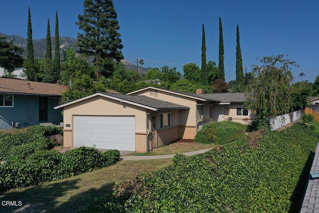 5020 Carolyn Way, Glendale, CA 91214 - ranch-style house featuring a garage and stucco siding