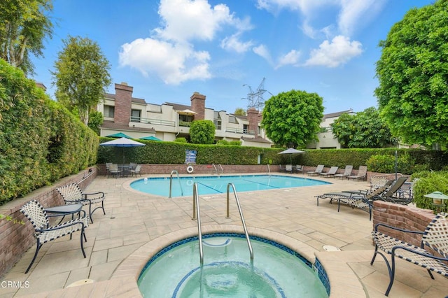 18751 Hatteras St Unit 13, Tarzana, CA 91356 - community pool featuring a hot tub and a patio area