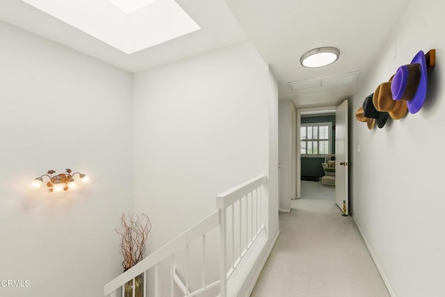 18751 Hatteras St Unit 13, Tarzana, CA 91356 - hall featuring light colored carpet, a skylight, and baseboards