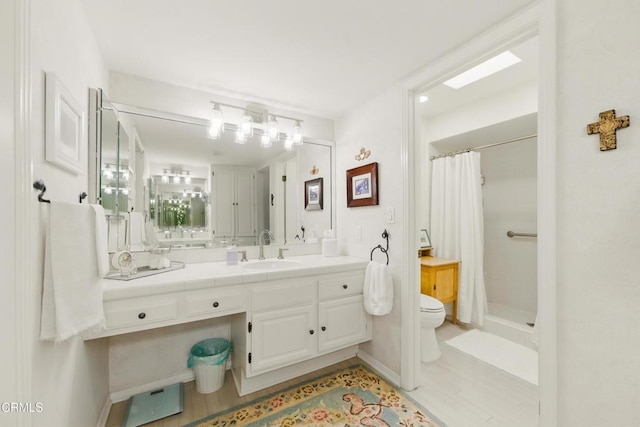 18751 Hatteras St Unit 13, Tarzana, CA 91356 - bathroom with toilet, vanity, and a shower stall