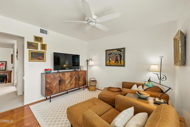 18751 Hatteras St Unit 13, Tarzana, CA 91356 - living area featuring a ceiling fan, wood finished floors, and baseboards