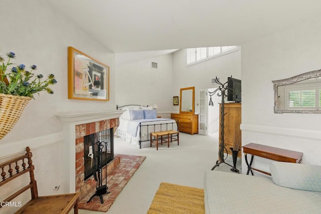 18751 Hatteras St Unit 13, Tarzana, CA 91356 - carpeted living area featuring a brick fireplace