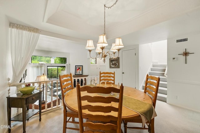 18751 Hatteras St Unit 13, Tarzana, CA 91356 - dining room with stairway, light carpet, a chandelier, and a raised ceiling