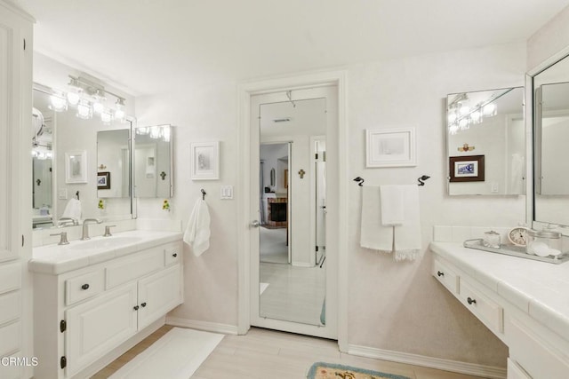 18751 Hatteras St Unit 13, Tarzana, CA 91356 - bathroom featuring vanity and baseboards