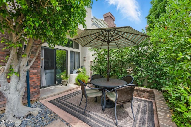 18751 Hatteras St Unit 13, Tarzana, CA 91356 - wooden deck with outdoor dining area and a patio