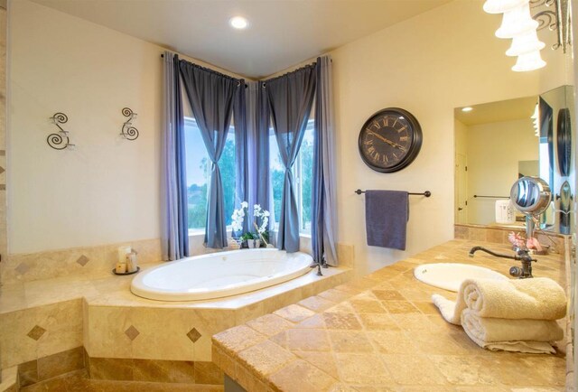 11606 Mesa Verde Dr, Valley Center, CA 92082 - bathroom featuring a garden tub, vanity, and recessed lighting