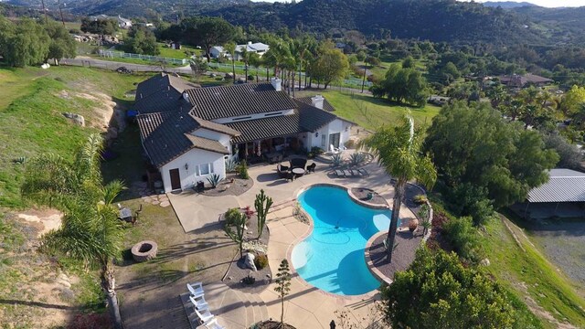 11606 Mesa Verde Dr, Valley Center, CA 92082 - aerial overview of property's location featuring a pool area and mountains