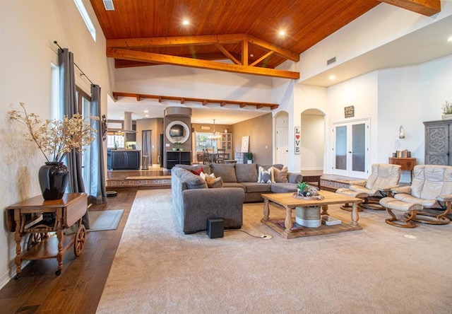 11606 Mesa Verde Dr, Valley Center, CA 92082 - living area with high vaulted ceiling, wooden ceiling with exposed beams, arched walkways, recessed lighting, and dark wood finished floors