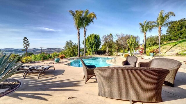 11606 Mesa Verde Dr, Valley Center, CA 92082 - outdoor pool featuring a patio area and a mountain view