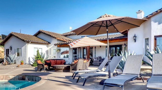 11606 Mesa Verde Dr, Valley Center, CA 92082 - back of house featuring outdoor lounge area, stucco siding, and a patio