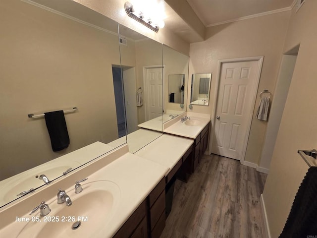 1760 E Palomar St Unit 111, Chula Vista, CA 91913 - full bath with wood finished floors, crown molding, and vanity