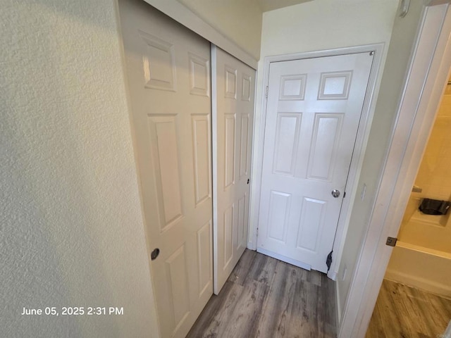 1760 E Palomar St Unit 111, Chula Vista, CA 91913 - hallway with wood finished floors