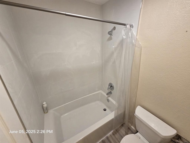 1760 E Palomar St Unit 111, Chula Vista, CA 91913 - bathroom featuring shower / bath combination with curtain, a textured wall, and wood finished floors