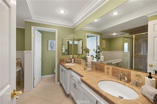29162 Bobolink Dr, Laguna Niguel, CA 92677 - full bathroom with a freestanding bath, a stall shower, double vanity, tile patterned floors, and crown molding