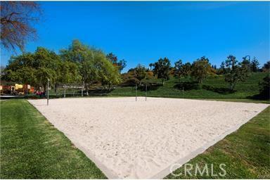 29162 Bobolink Dr, Laguna Niguel, CA 92677 - view of home's community with volleyball court and a lawn
