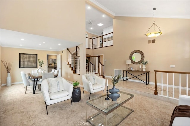 29162 Bobolink Dr, Laguna Niguel, CA 92677 - carpeted living area with crown molding, stairs, baseboards, a towering ceiling, and recessed lighting