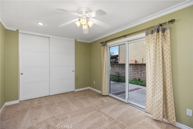 29162 Bobolink Dr, Laguna Niguel, CA 92677 - unfurnished bedroom featuring access to exterior, carpet flooring, baseboards, crown molding, and a closet