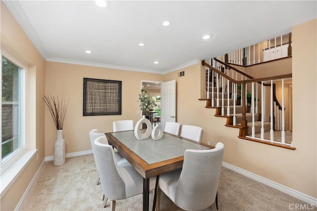 29162 Bobolink Dr, Laguna Niguel, CA 92677 - carpeted dining room with stairway, recessed lighting, healthy amount of natural light, baseboards, and ornamental molding