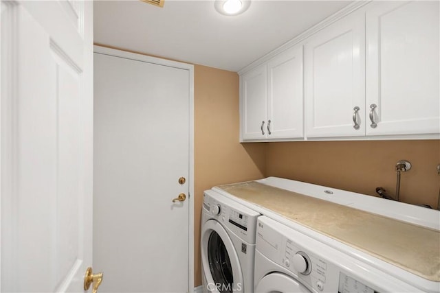 29162 Bobolink Dr, Laguna Niguel, CA 92677 - laundry room with washing machine and dryer and cabinet space
