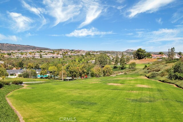 29162 Bobolink Dr, Laguna Niguel, CA 92677 - view of property's community with view of golf course, a mountain view, and a lawn