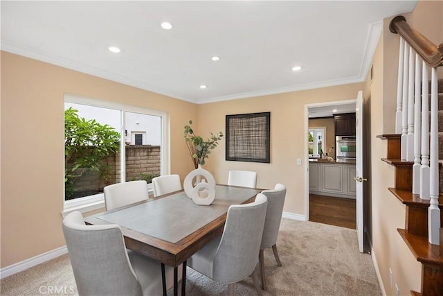 29162 Bobolink Dr, Laguna Niguel, CA 92677 - dining area featuring light carpet, recessed lighting, ornamental molding, baseboards, and stairs