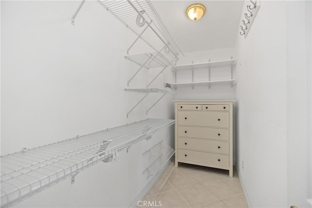 29162 Bobolink Dr, Laguna Niguel, CA 92677 - spacious closet featuring light tile patterned floors