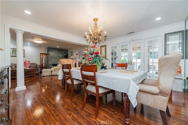 1855 Turnbull Canyon Rd, Hacienda Heights, CA 91745 - dining room with crown molding, hardwood / wood-style flooring, french doors, a chandelier, and decorative columns