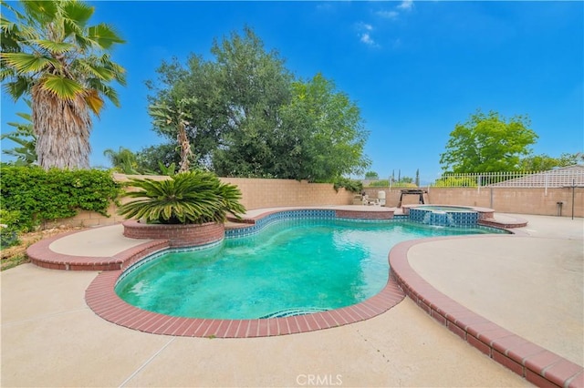1855 Turnbull Canyon Rd, Hacienda Heights, CA 91745 - view of pool featuring a patio area, a fenced backyard, and a pool with connected hot tub