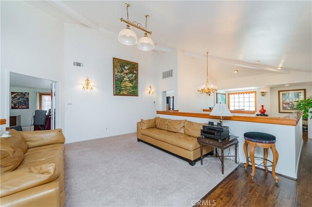 1855 Turnbull Canyon Rd, Hacienda Heights, CA 91745 - living room featuring plenty of natural light, beamed ceiling, a chandelier, high vaulted ceiling, and dark wood-style flooring