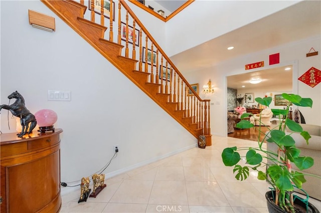 1855 Turnbull Canyon Rd, Hacienda Heights, CA 91745 - stairs featuring tile patterned flooring, recessed lighting, and baseboards